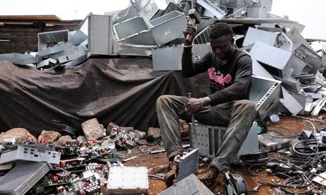 MDG : Electronics waste or e-waste in Africa : Teenage boys dismantle computer in Accra, Ghana 